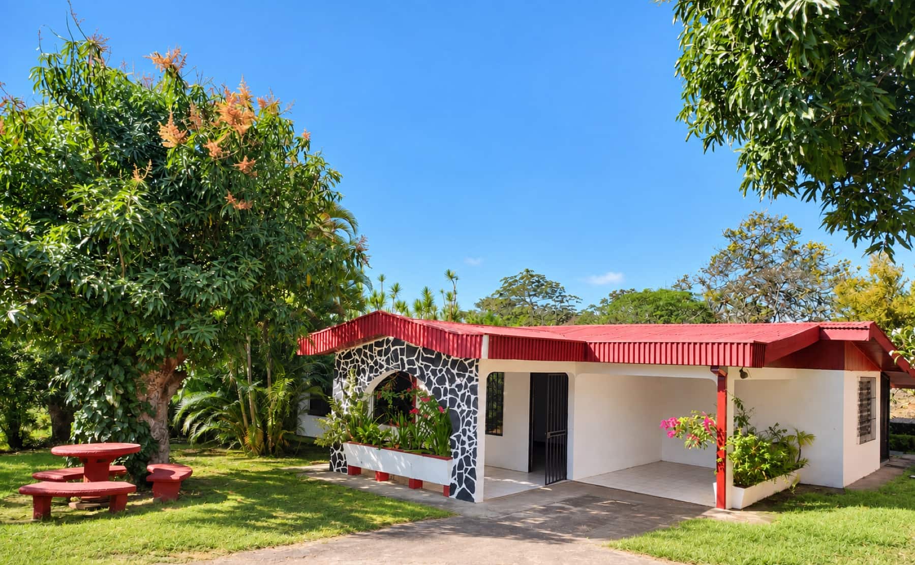 Front of the house with planters and lawn